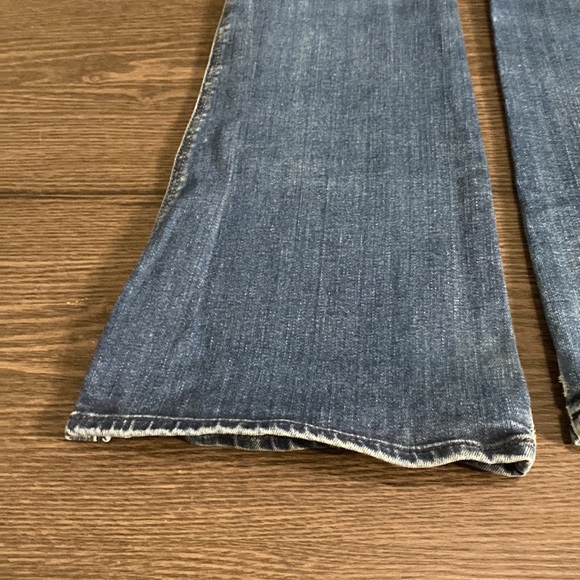 7 for all mankind boot cut flare jeans. Size 27. Medium wash. Faded front. - Picture 15 of 16